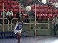 Santo Domingo, Repubblica Dominicana  7 marzo 2004  Una giovane atleta esegue una battuta durante una partita di pallavolo dei Giochi Nazionali Salesiani Don Bosco 2004.