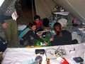 Abbottabad, Pakistan  19 ottobre 2005  La volontaria Arianna, accompagnata da due giovani volontarie spagnole, Marta e Pilar, mentre ordinano gli strumenti e i medicinali per le cure dei feriti.