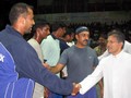 Mumbai, India  7 novembre 2005  Lispettore di Mumbai, don Ivo Coelho, si congratula con alcuni atleti in occasione del torneo nazionale di Basket Savio Cup che si svolge presso la Don Bosco High School.