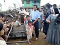 6 giugno 2008 - Mons. Charles Maung Bo, arcivescovo di Yangon, tra la popolazione colpita dal ciclone Nargis.