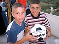 28 luglio 2006  Giovani con il pallone Don Bosco VIS. 
