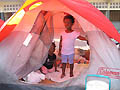 15 febbraio 2010 - Due bambine superstiti del terremoto in una tenda nel campo allestito dai salesiani.