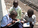 9 settembre 2013 - Studenti fanno il primo compito dell`anno scolastico presso il Centro Don Bosco di Goma-Ngangi.
